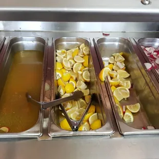 Home pickled carrots and jalapeño, lemon, radish bar.