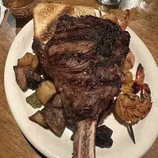 Tomahawk Ribeye. Potatoes. Shrimp Skewer.