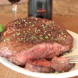 54 oz. Belly Buster It barely fits on the plate! Eat it all &amp; earn a free t-shirt &amp; your photo on our Belly Buster Wall of Fame