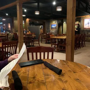 a woman reading a menu