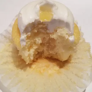Lemon curd inside of the lemon cupcake with the lemon frosting!!