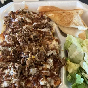Brisket potato, salad, and toast.
