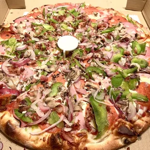 Rubino's Special Pizza. Medium (10 slices). Vegetables are thinly sliced as to not overpower the mozzarella cheese which is the best part!