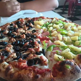 1/2 Sausage, olive, and mushrooms and 1/2 Canadian bacon, pineapple, and bell peppers.