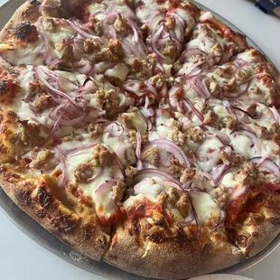 Medium sausage and onion pizza