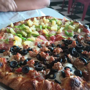 1/2 Sausage, olive, and mushrooms and 1/2 Canadian bacon, pineapple, and bell peppers.