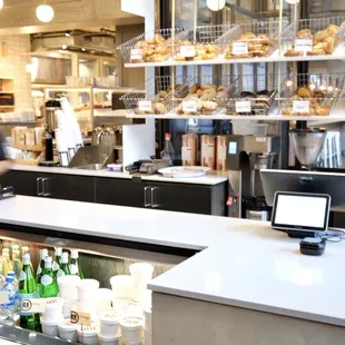 a woman working behind the counter