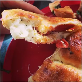 Can't go wrong with a calzone and they will add whatever you want in it.