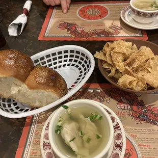 a bowl of soup and a sandwich