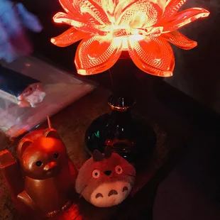 The reception desk with lucky cat toothpick holder and lotus lamp