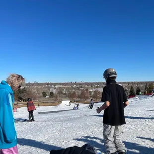Snowboarding on a bluebird day.