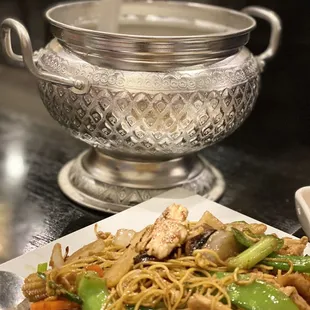 a plate of stir fried noodles