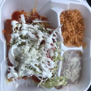 Cheese enchiladas with rice and beans.
