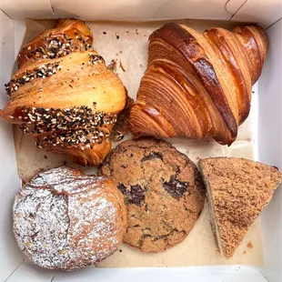 Everything croissant, plain croissant, chocolate almond croissant, chocolate chip cookie, coffee cake