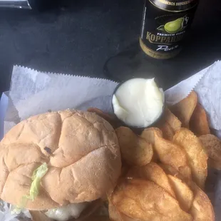 Mushroom Swiss burger with fries
