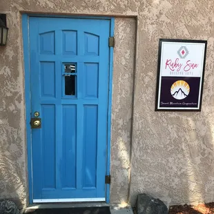 Beautiful Blue Door Welcomes You!