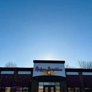 the front entrance of a restaurant