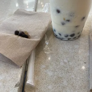 Pineapple smoothie with too much boba even after I said no boba.
