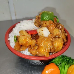 a bowl of chicken and rice