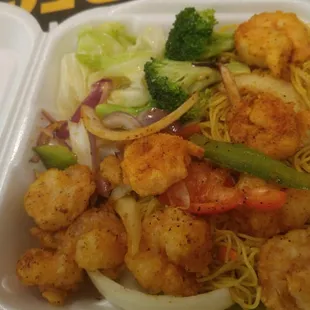Bang bang shrimp curry rice noodles and vegetables.