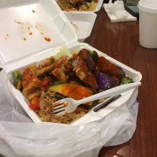 Eggplant and tofu with fried rice and veggies