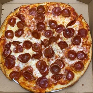 a pepperoni pizza in a box