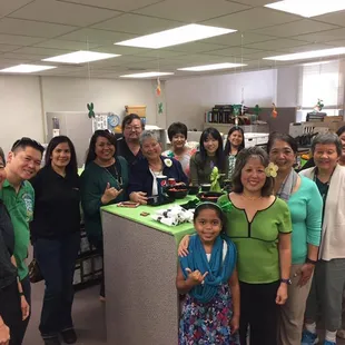 Hawaii Public Library System and KUMU enjoying an office luncheon party