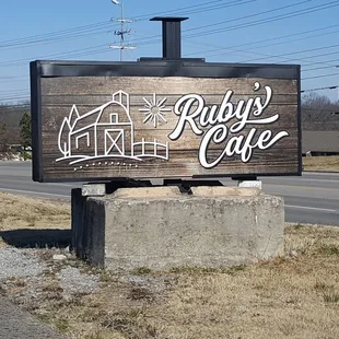 a sign for ruby&apos;s cafe