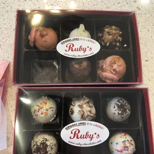 Assortment of truffles, including maple bacon, key lime, salted caramel, turtle, birthday cake, and cookies and cream.