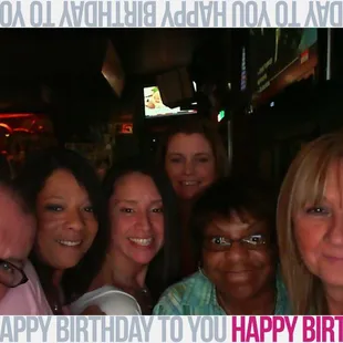 a group of people posing for a picture