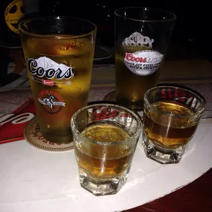 three glasses of beer on a table
