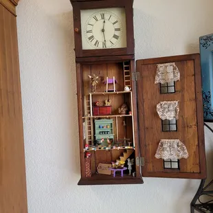 a clock in a cabinet