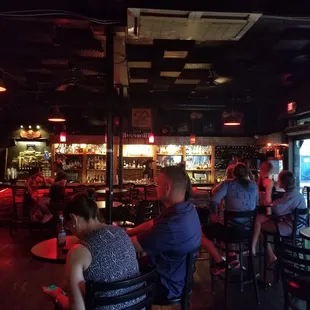 people sitting at a bar