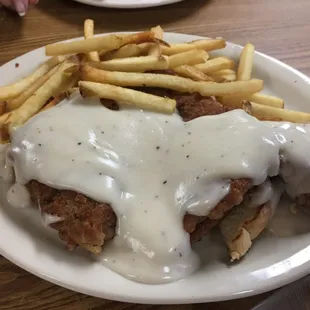 Open face chicken fry sammi with toast and fries, also includes their tasty salad bar. Yum yum yum.