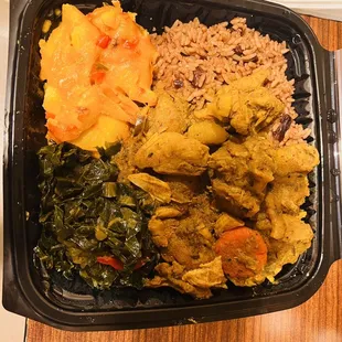 Curry Chicken, rice and peas, collard greens and mac n cheese