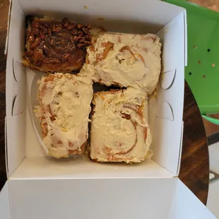 a box of cinnamon rolls