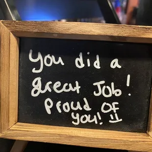 a chalkboard with a message on it