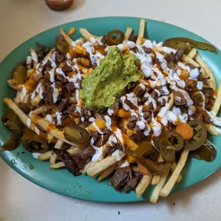 Massive carne asada crispy fries nachos! Yes sir! :+) (2 meals)