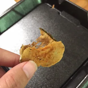 Waaaay over cooked fried pickle. Consistency of a potato chip