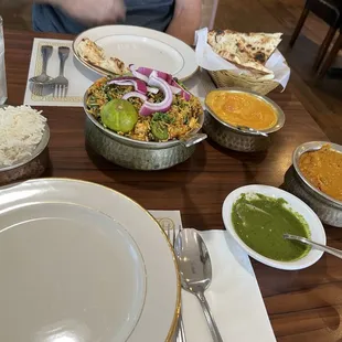 Amazing food! Garlic Naan, Navaratan Kurma, Chicken Tikka Masala and Paneer Biryani.