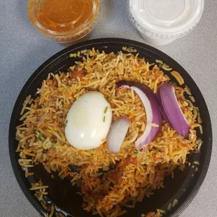 Chicken biriyani ($14) with yogurt and curry sauce