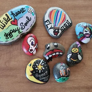 a variety of painted rocks