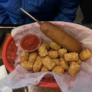 Kid&apos;s corn dog with tots.