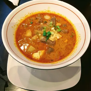 Massamun Beef and Tofu*: Rich peanut curry, potatoes, onions, carrots.
