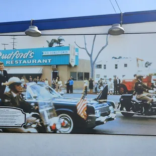 President Kennedy&apos;s motorcade passes Rudford&apos;s, June 1963