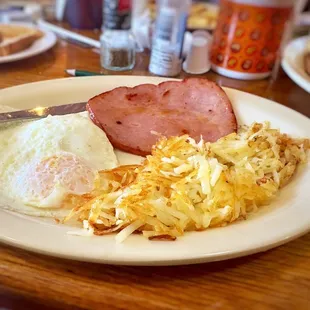 Basic two eggs with hash browns and ham. Good chunk of ham.