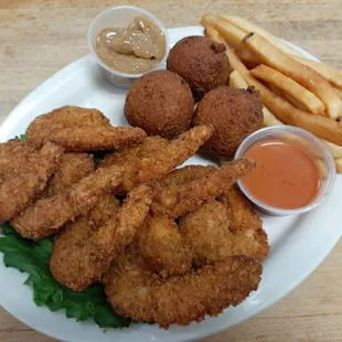 Shrimp dinner with Hush puppies and French fries