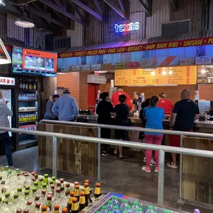 Beer, bottled drinks, side dishes in the line to the counter to order your meat.