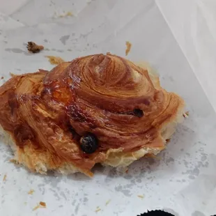 Half eaten raisin/cinnamon roll