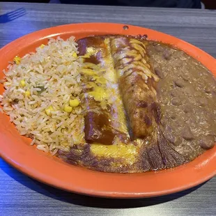 Second plate of the Acapulco, cheese enchilada and chicken tamale topped with chili gravy and served with rice and beans. Yum!